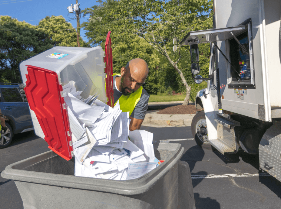 Man shredding documents