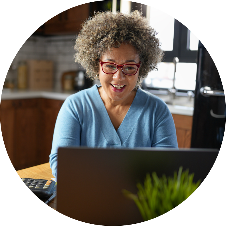 Lady smiling at computer