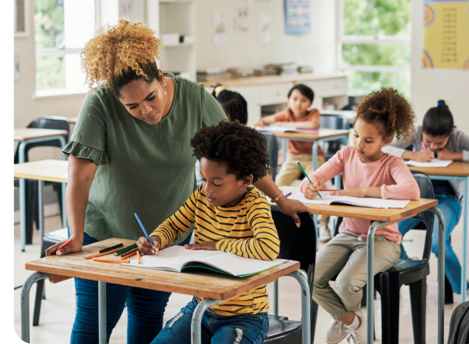 Teacher helping student