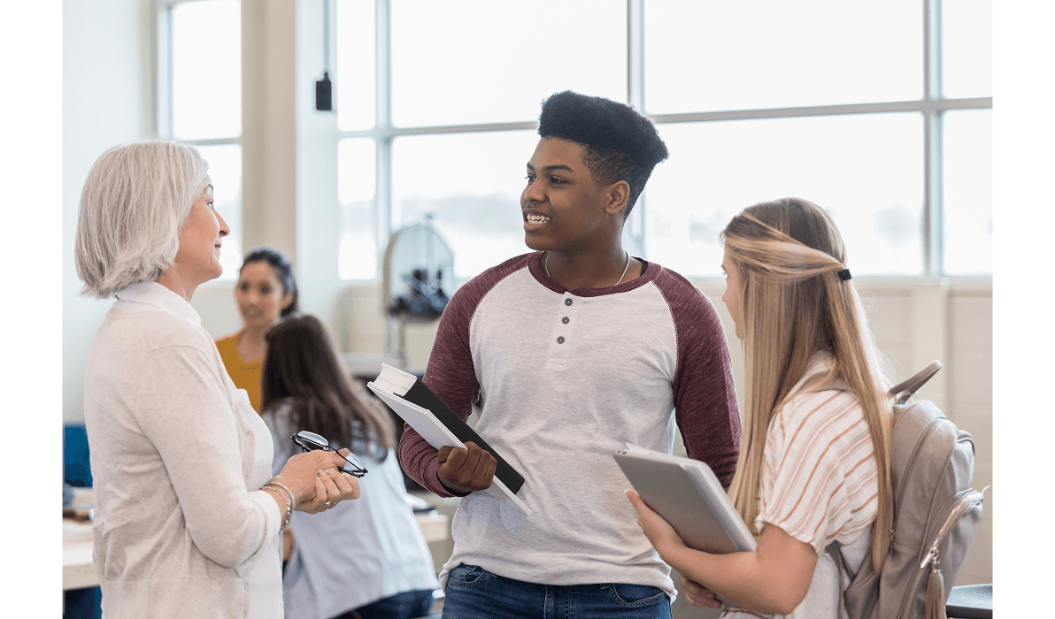 Teacher with students