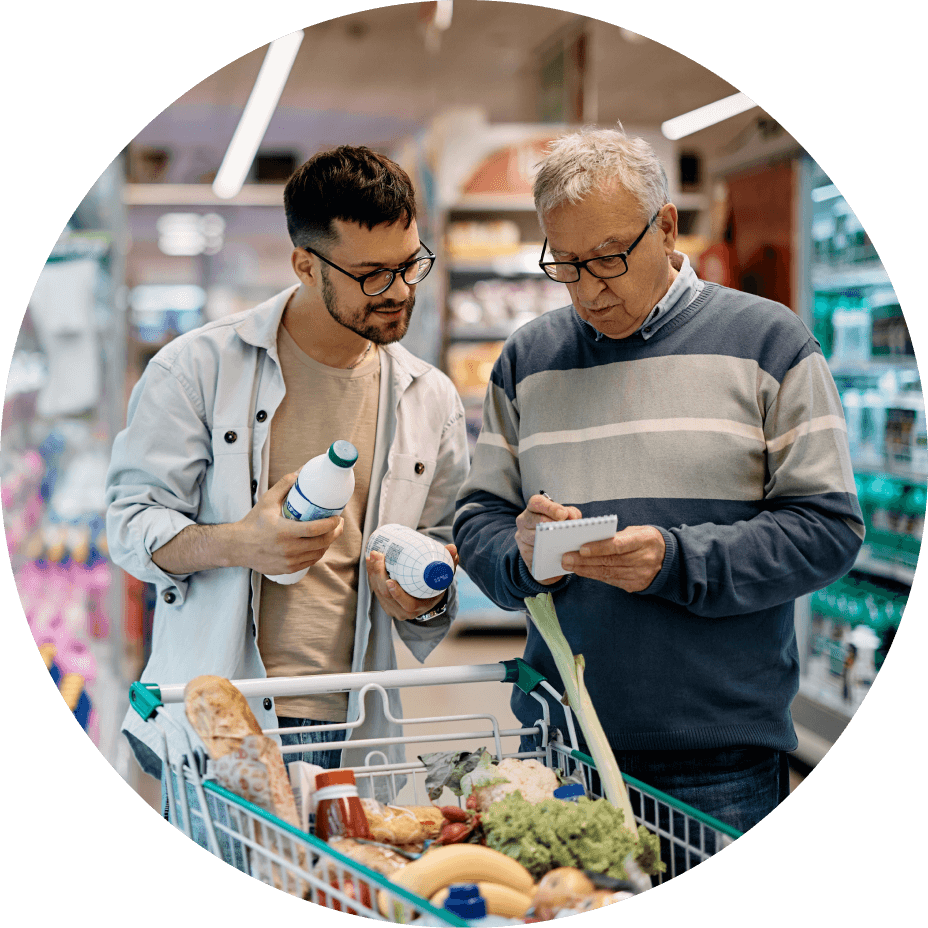 Two men grocery shopping 