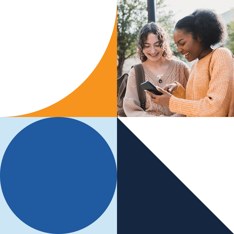 two students with backpack on phone