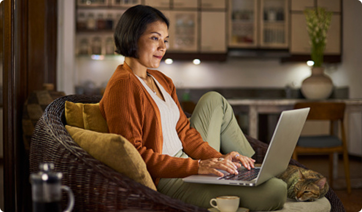 lady in home browsing computer