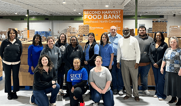 Employees volunteering at the food bank
