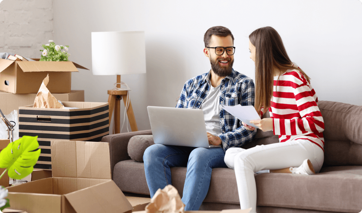 Couple in new home with paperwork