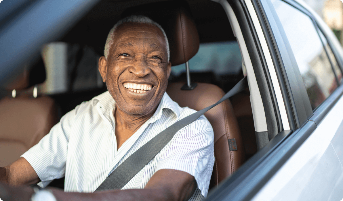 Older Gentleman Driving Car