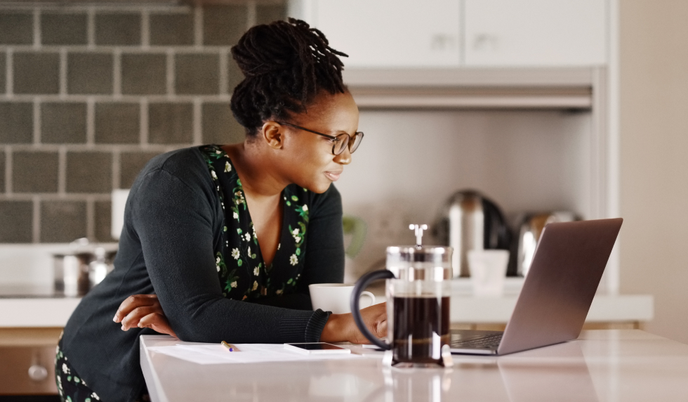 Lady working from home in kitchen