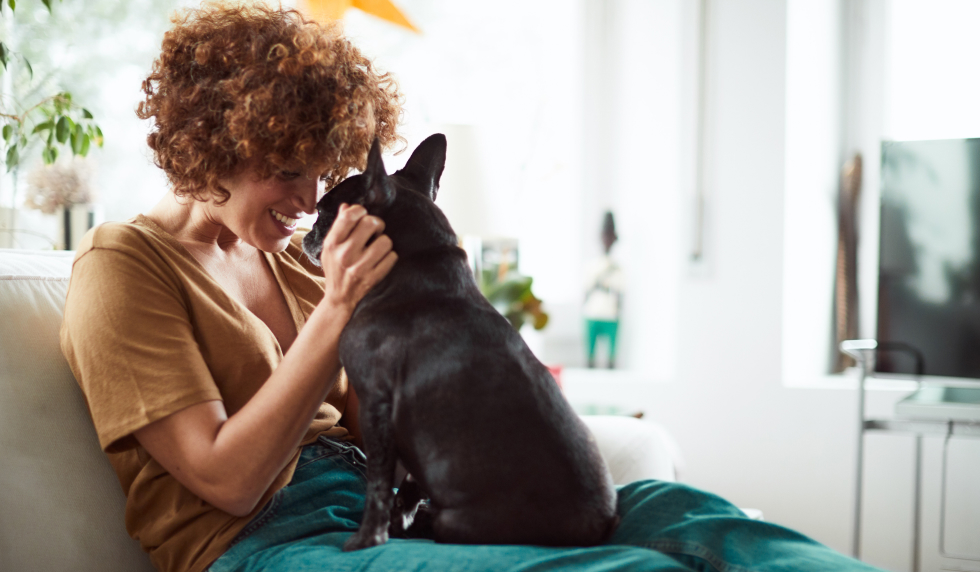 Woman loving on her dog