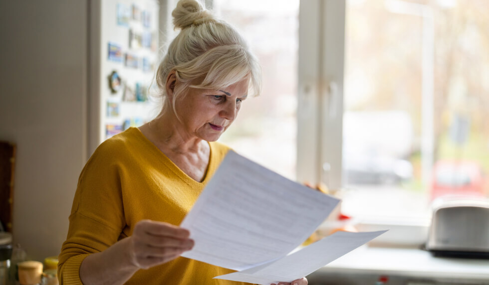 woman reading paperwork