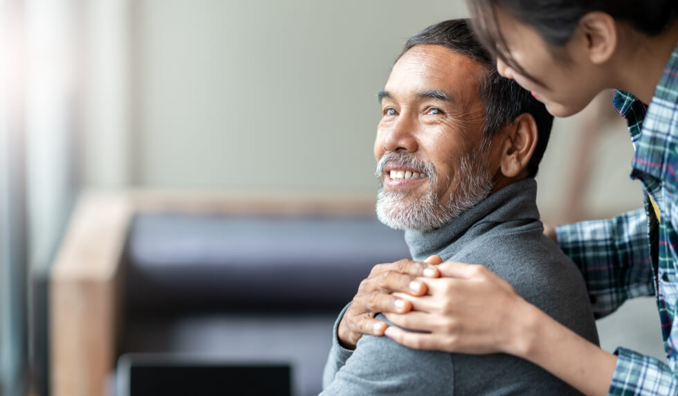 woman comforting man