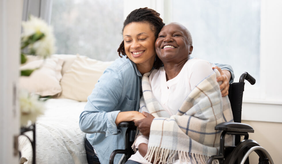 What is a Special Needs Trust? Elderly woman in wheel chair with guardian