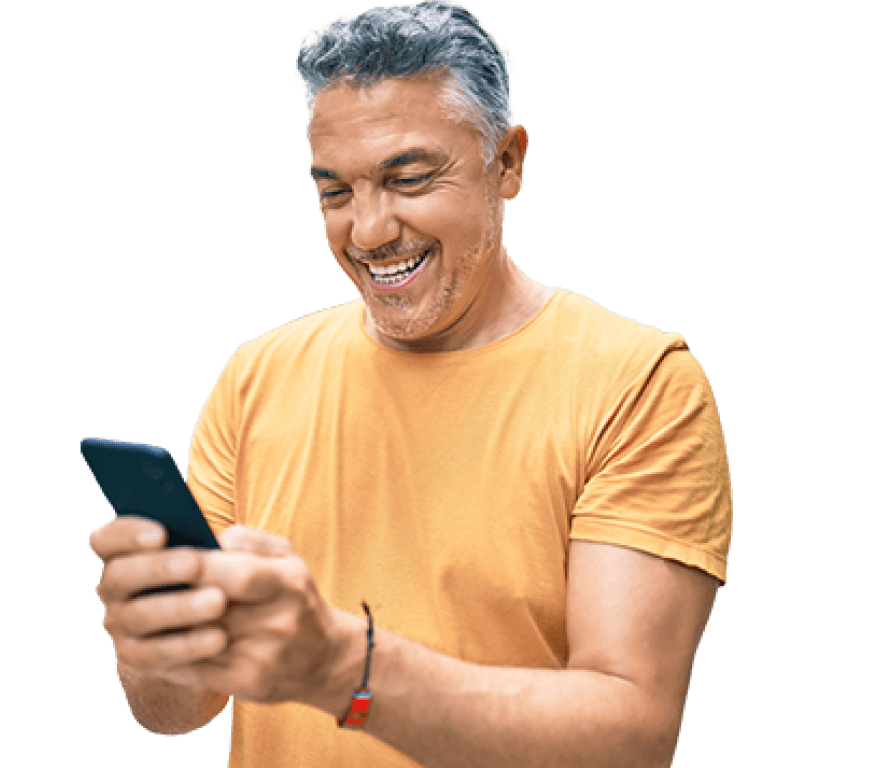 silhouette of man with cell phone smiling